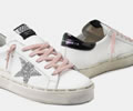 GGDB White Hi-Star sneakers with glittery star and pink laces
