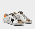 Golden Goose Superstar sneakers with leopard-print insert, glittery star and orange heel tab