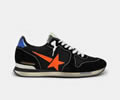 GGDB Black Running sneakers with fluorescent orange star